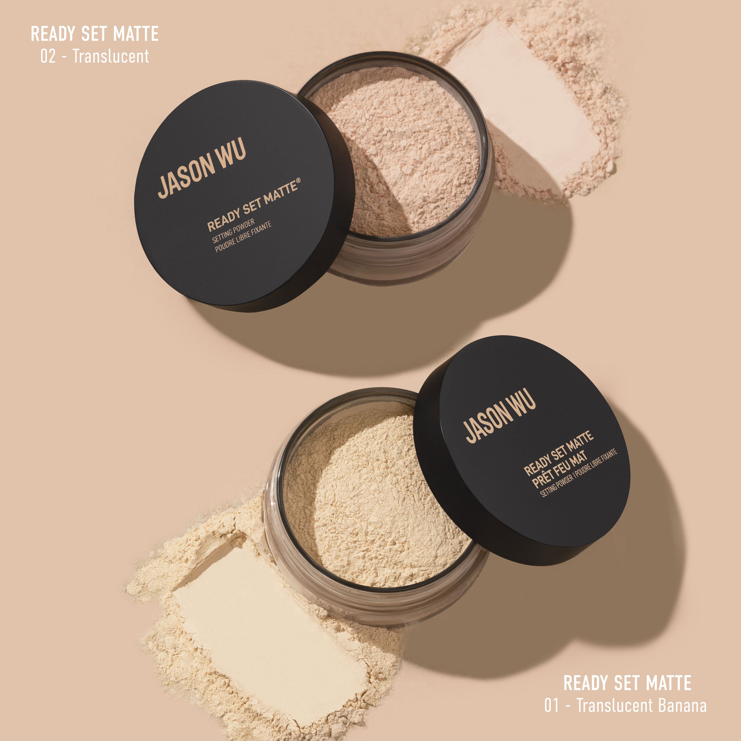Two containers of Jason Wu Ready Set Matte loose powder in shades Translucent and Translucent Banana.