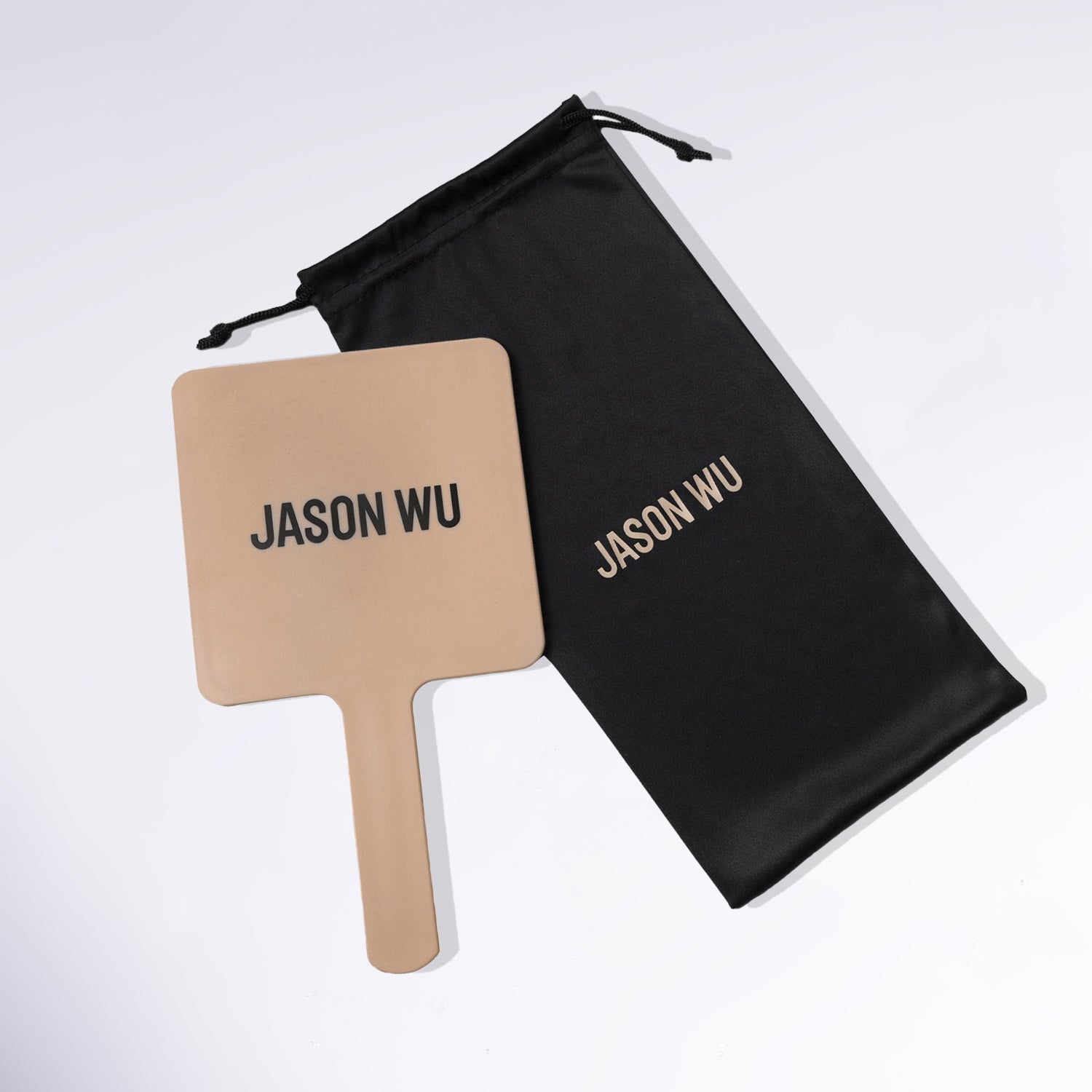 A JWB hand mirror with storage pouch