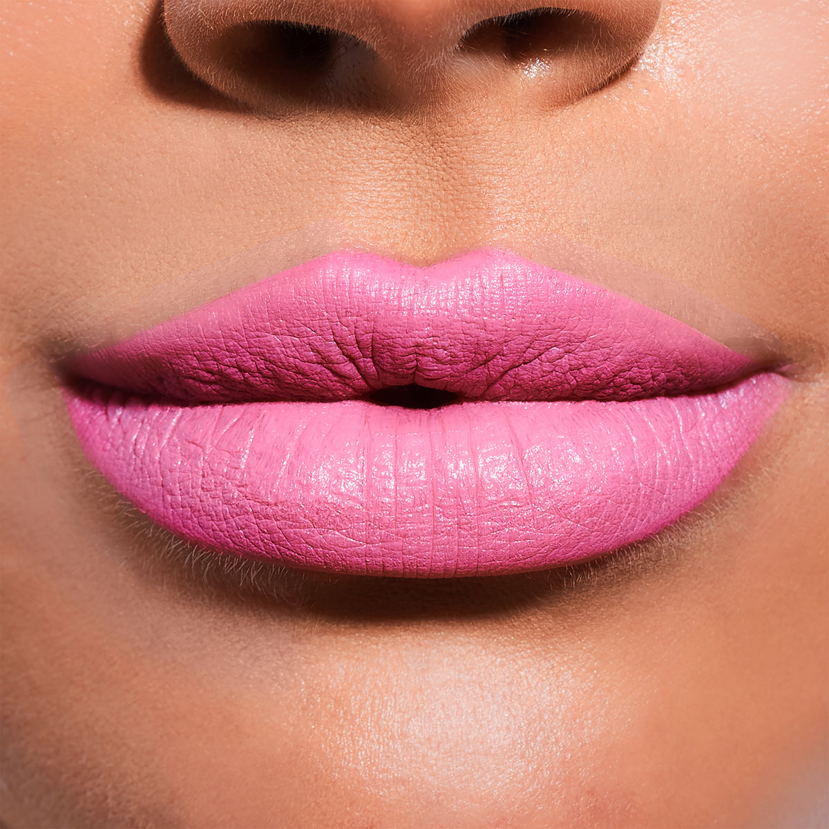 Close-up of lips with pink lipstick