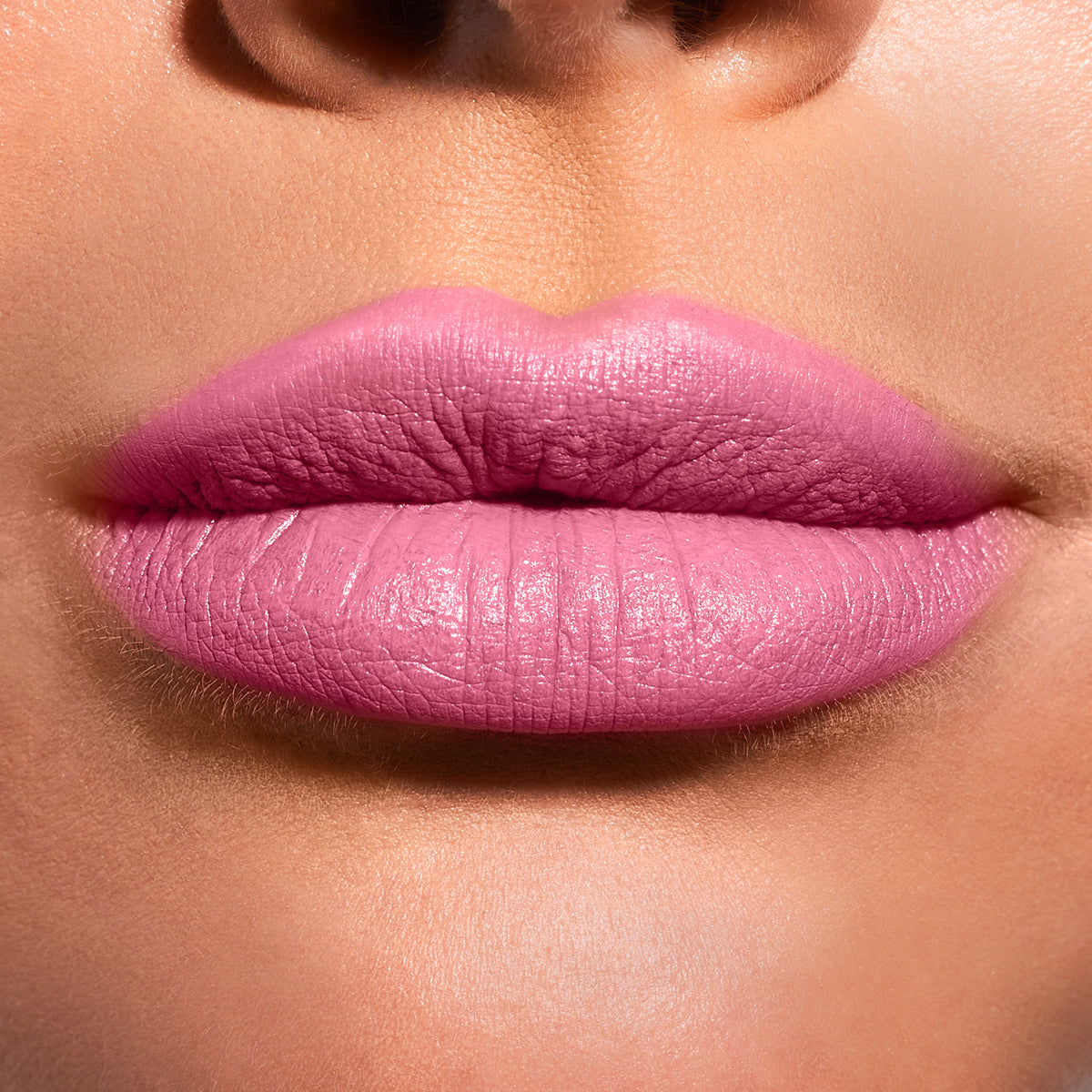 Close-up of lips with pink lipstick