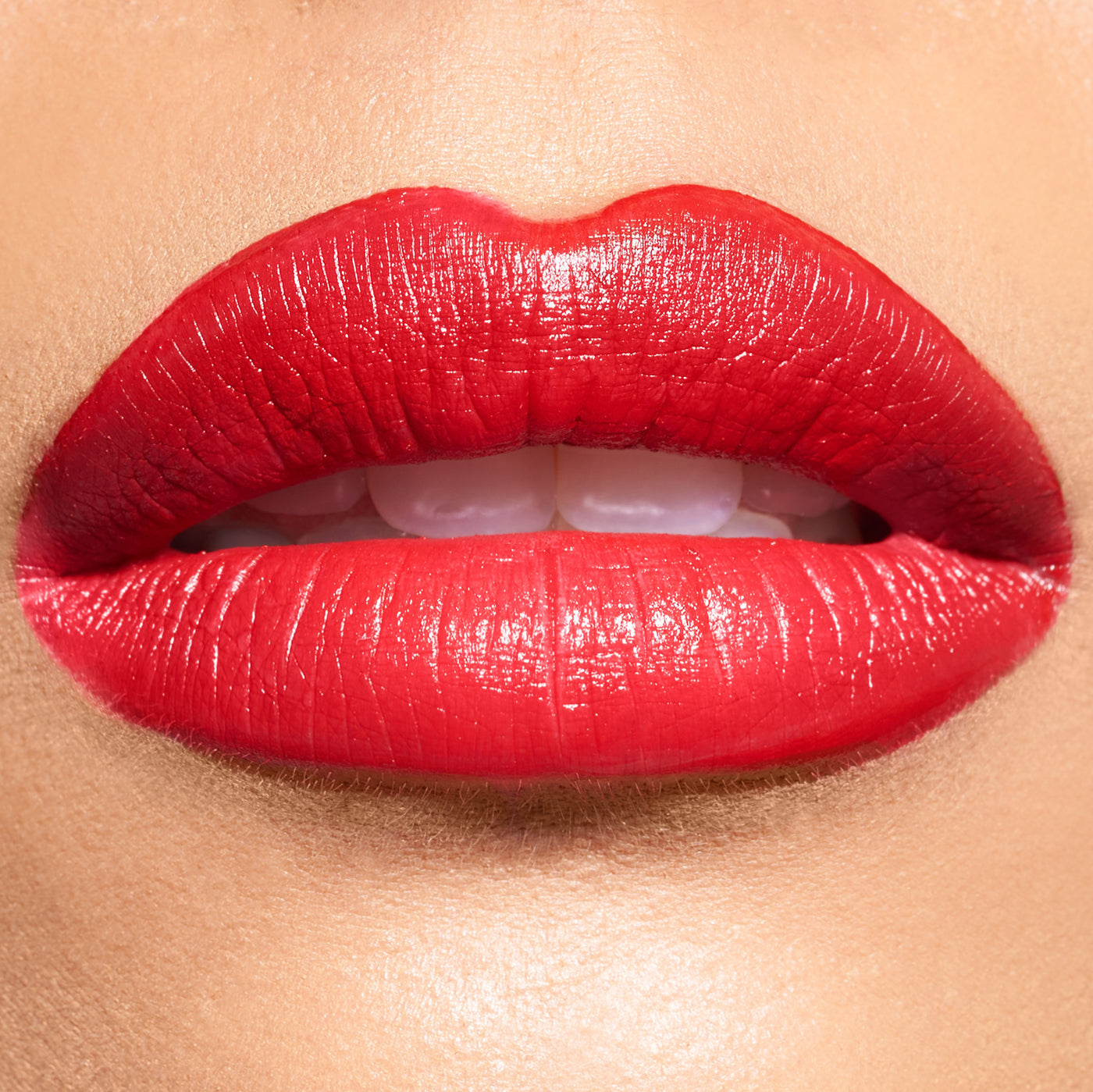 Close-up of lips wearing red lipstick