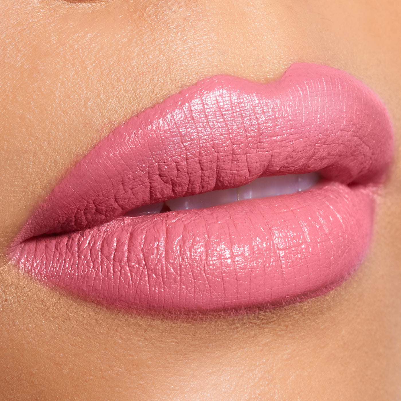 Close-up of lips with pink lipstick