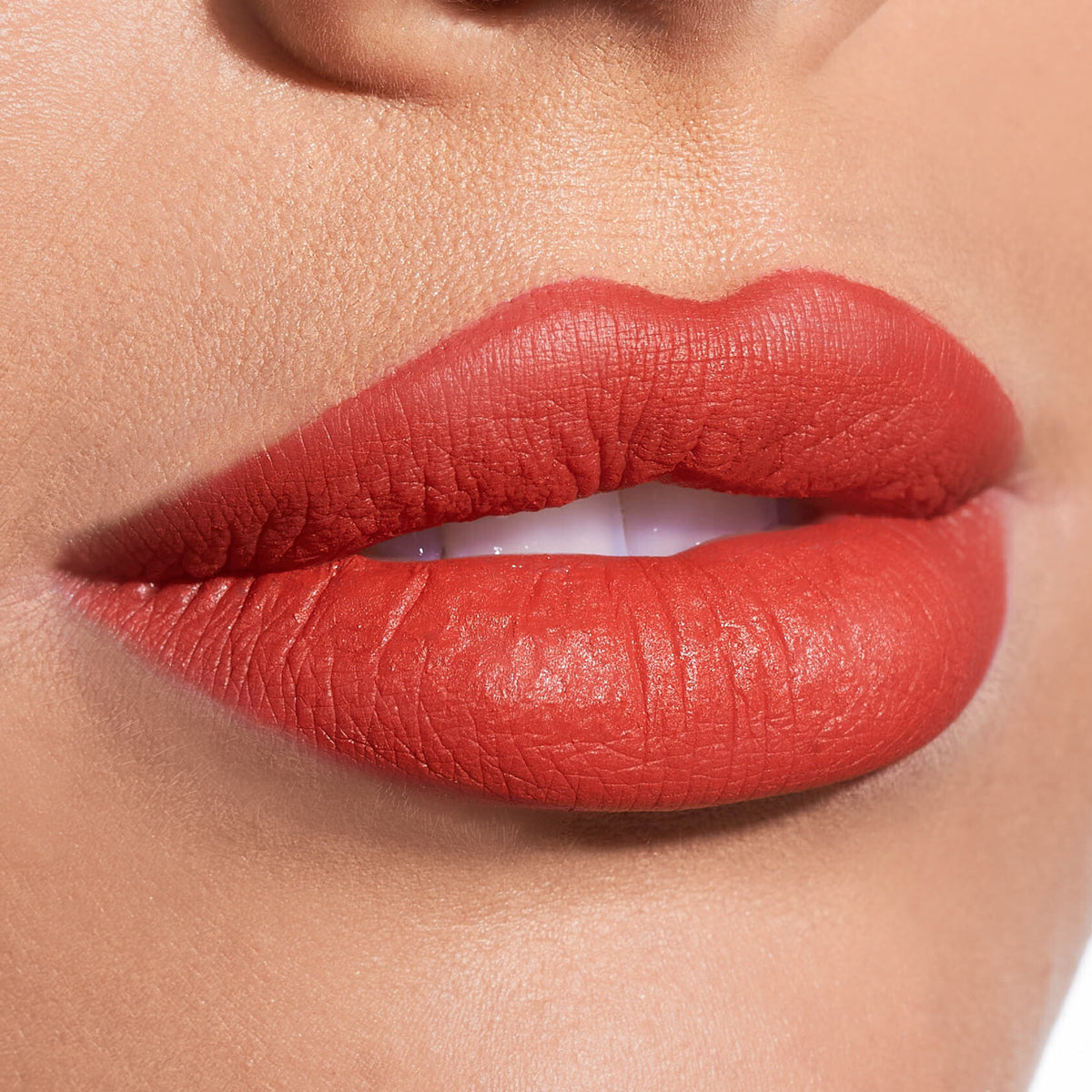 Close-up of lips with red lipstick