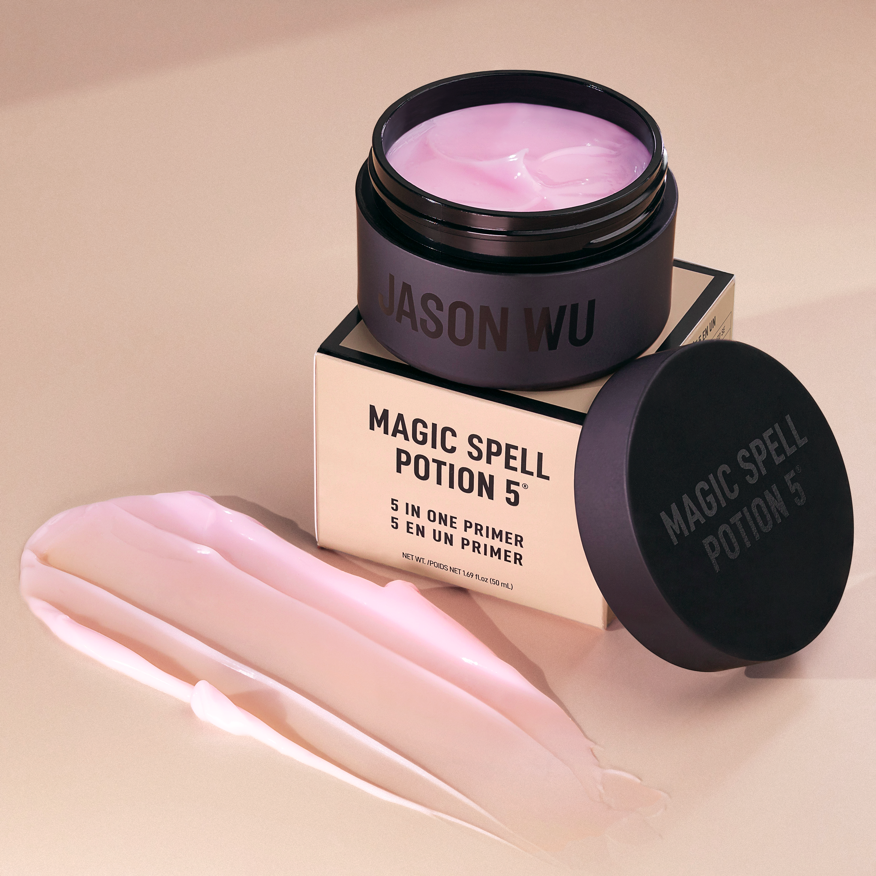 Jar of Magic Spell Potion 5 primer with product swatch on beige background.